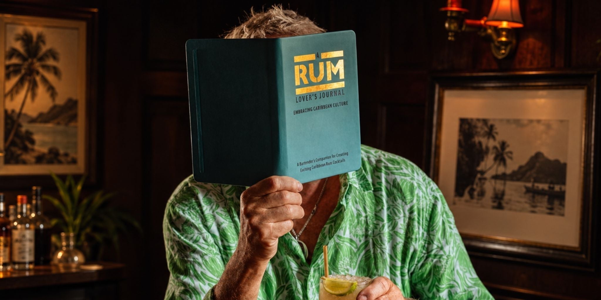 Kevin Snook holing up a rum lovers journal in front of his face