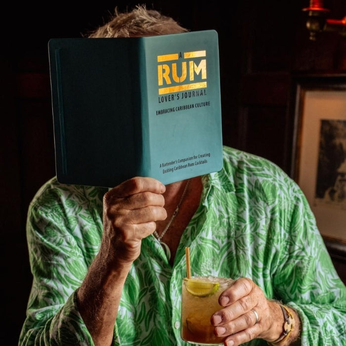 Snooky holds a Rum Lover's Journal