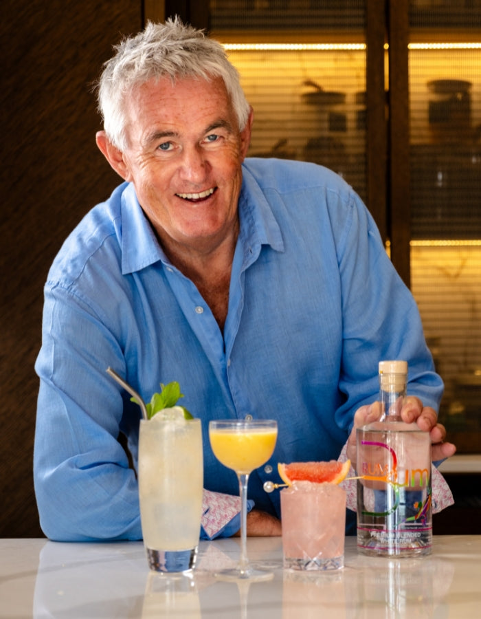 Rum Bum founder Kevin Snook with rum cocktails