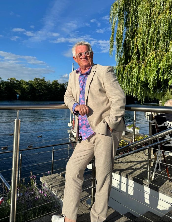 Kevin Snook standing beside the River Thames