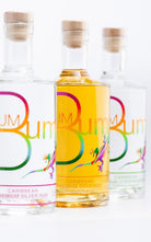 Rum Bum Gold Rum between Silver and Overproof bottles