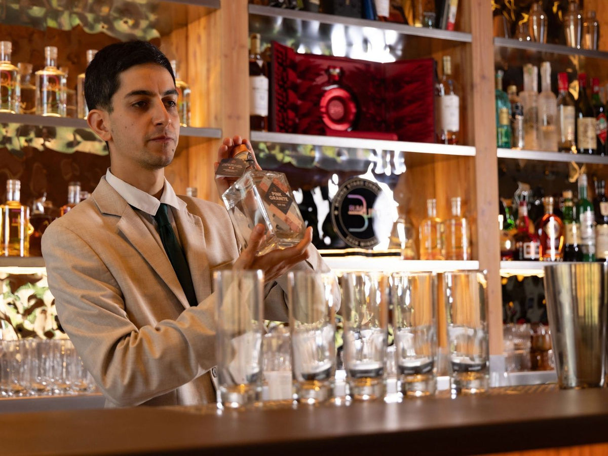 Rising Stars finalist measures an ingredient behind the bar at The Braywood