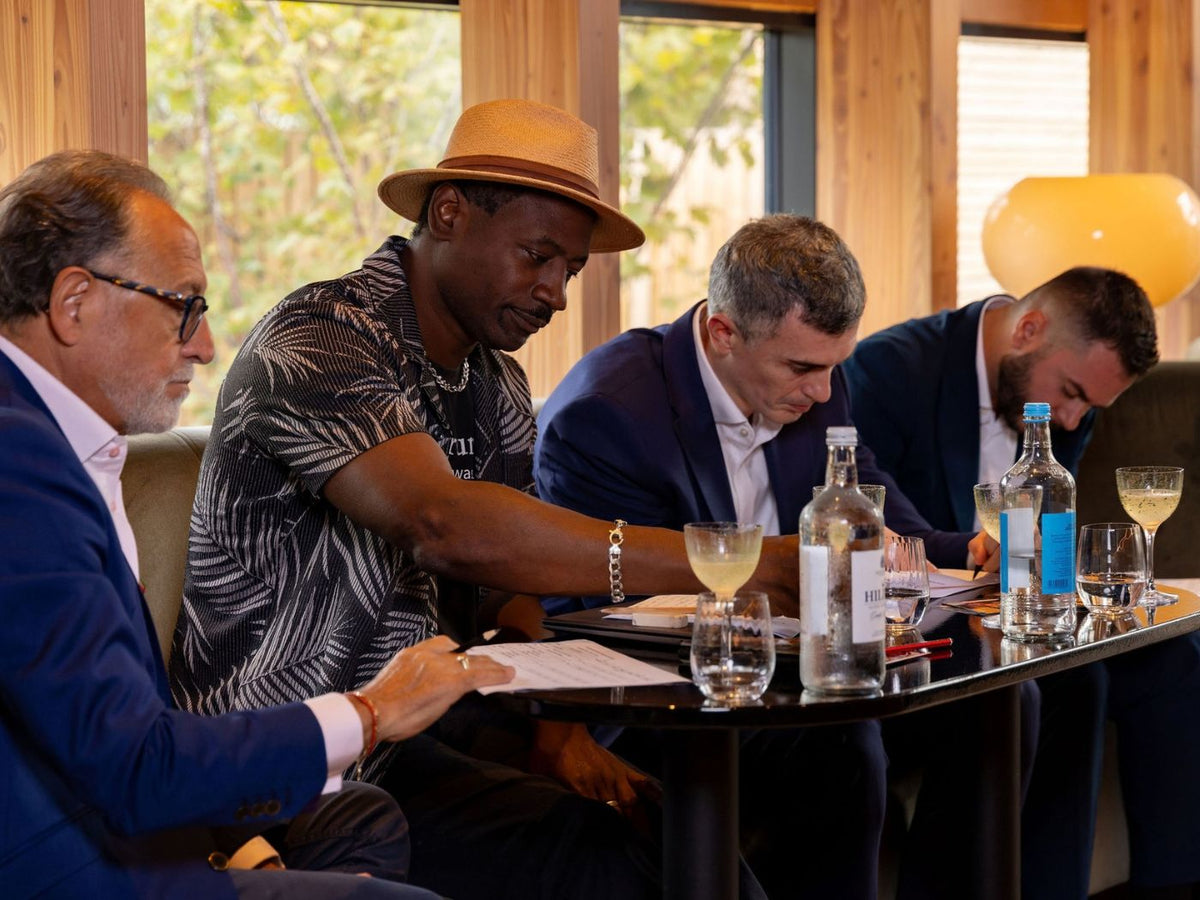Judges including Ian Burrell and Salvatore Calabrese make notes during the competition