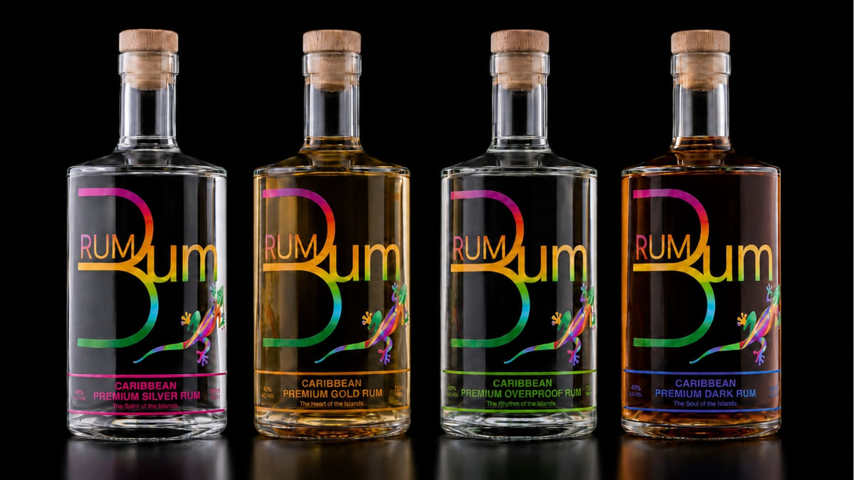 Four Rum Bum Caribbean rum bottles. Silver gold overproof and dark varieties on a black background.